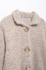 Elegant Knitted Cardigan with Floral Button