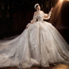 Luxury Long Sleeves Beaded Wedding Ball Gown