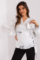Formal blouse with an envelope front