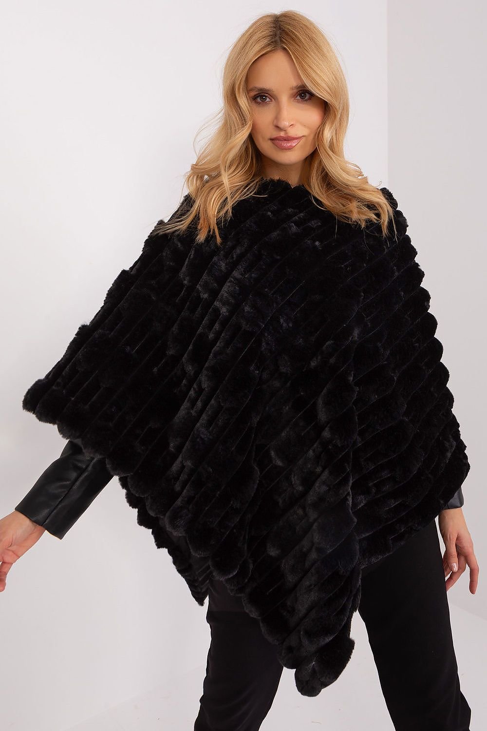 Loose cut varied fabric texture poncho