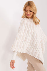 Loose cut varied fabric texture poncho