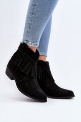 Natural leather heel boots decorated with tassels