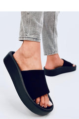 Soft black flip-flops on a rubber sole