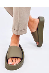 Soft green flip-flops on a rubber sole