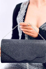 Envelope clutch bag with shimmering finish