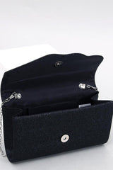 Envelope clutch bag with shimmering finish