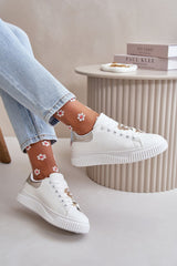 Low sneakers with cute badges