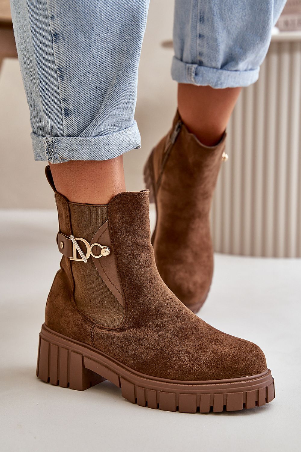 Soft eco-suede boots with gold detail