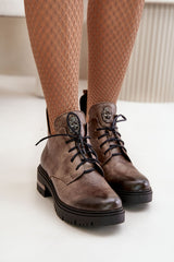 Fashionable ankle boots with a decoration