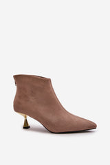 Stylish ankle boots on a decorative heel