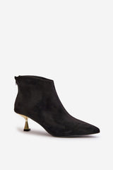 Stylish ankle boots on a decorative heel