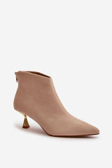 Stylish ankle boots on a decorative heel