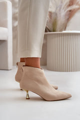 Stylish ankle boots on a decorative heel