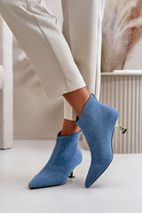 Stylish ankle boots on a decorative heel