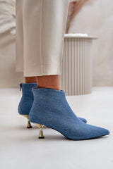 Stylish ankle boots on a decorative heel