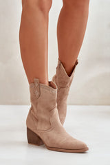 Cowboy-style heel ankle boots