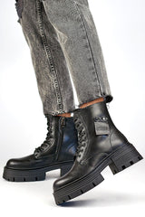 Black natural leather boots