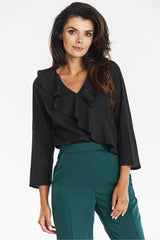 Elegant blouse with a frill