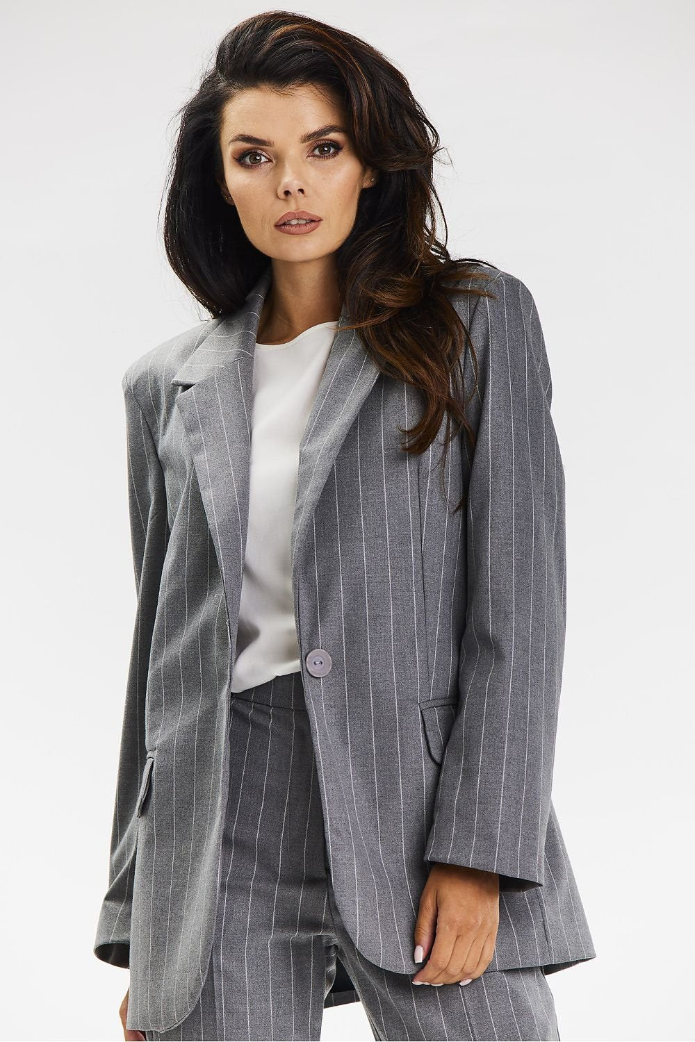 Elegant jacket with a loose striped cut.