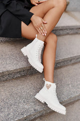 Stylish white boots with a low upper