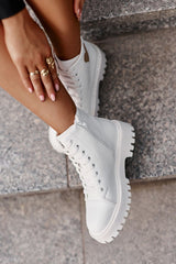 Stylish white boots with a low upper