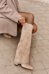 Beige heel boots with a loose upper