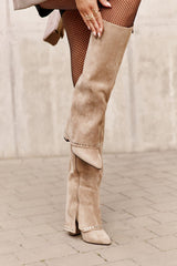 Beige heel boots with a loose upper