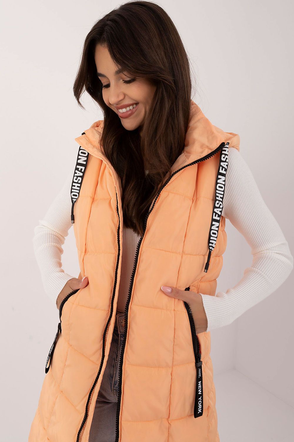 Quilted reversible vest with hood