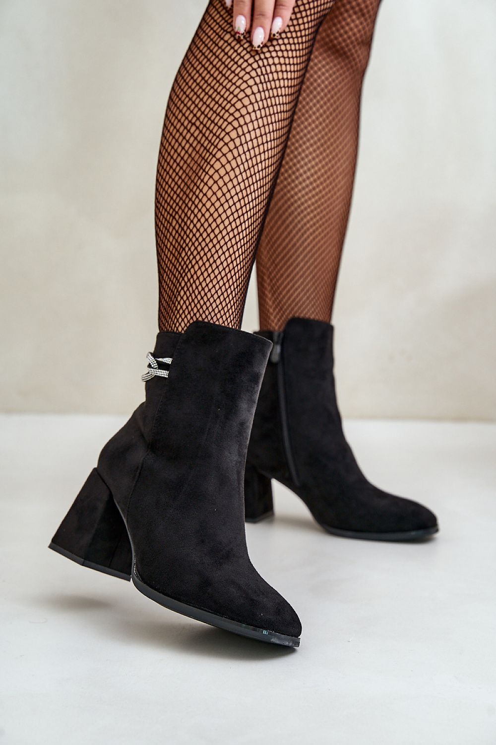 Higher upper black heel boots