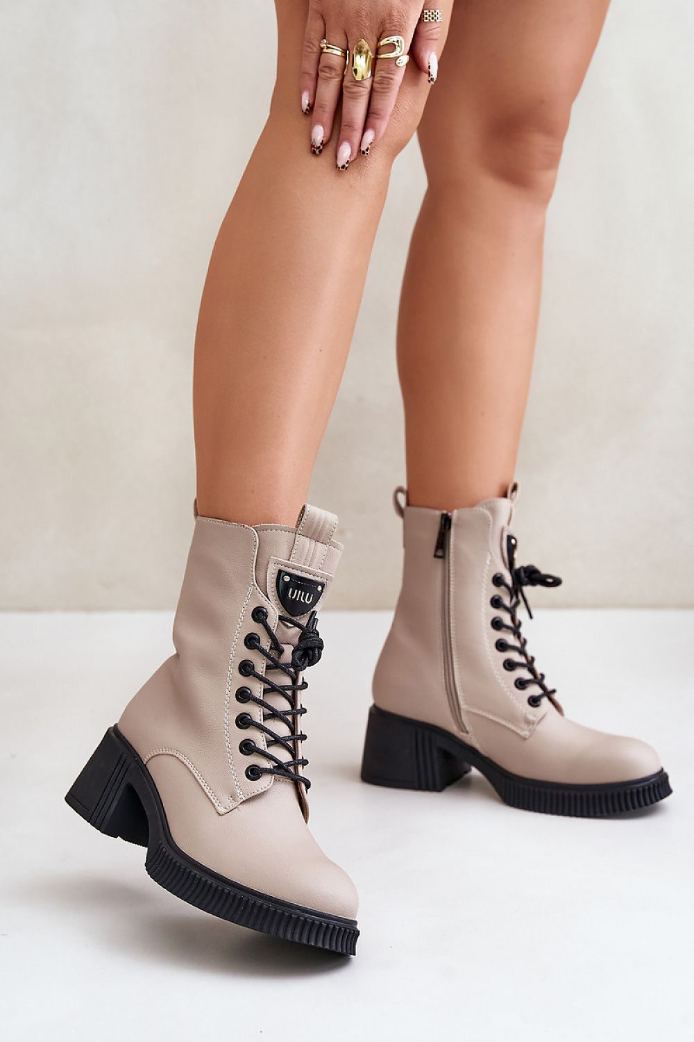 Beige heel boots made of natural leather