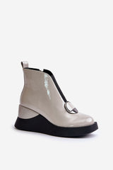 Elegant buskin boots set on a wedge