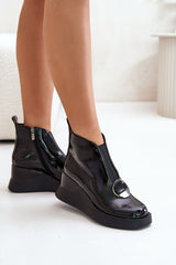 Elegant buskin boots set on a wedge