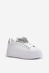 White sneakers with decorative shiny butterfly