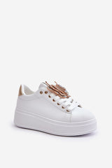 White sneakers with decorative shiny butterfly