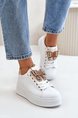 White sneakers with decorative shiny butterfly