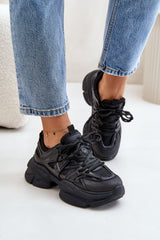 Black sneakers set on a chunky sole