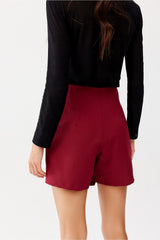 Asymmetrical front flap skirt pants