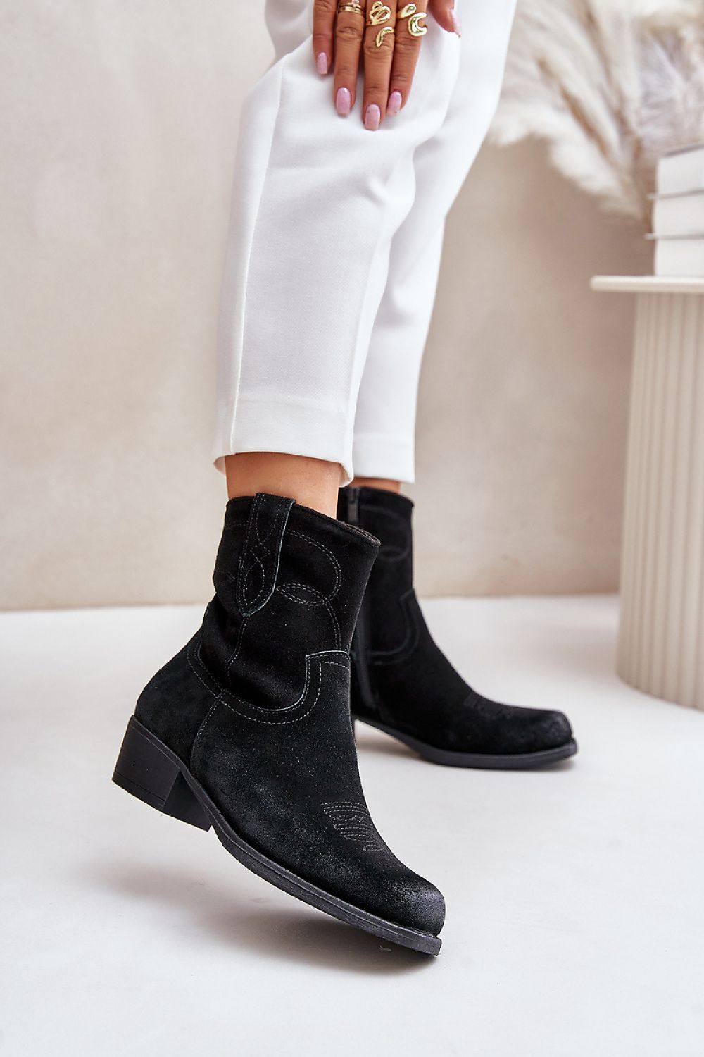 Fashionable cut cowboy heel boots