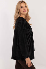 Velour blouse with decorative creasing