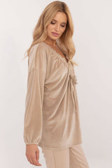 Velour blouse with decorative creasing