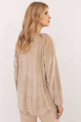 Velour blouse with decorative creasing