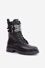 Stylish black boots with decorated belt