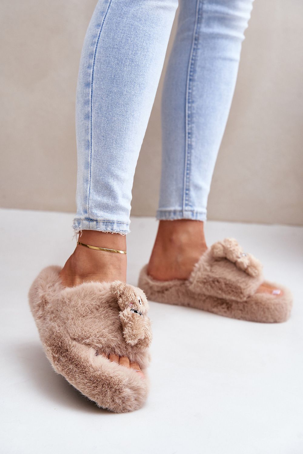 Women's fur slippers with a cute teddy bear