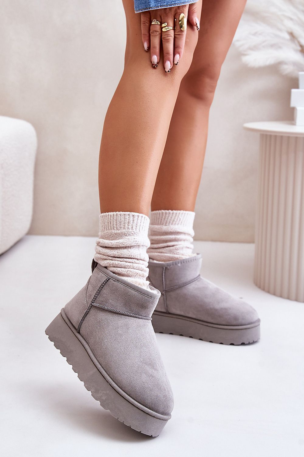 Stylish grey snow boots with ankle-high shaft