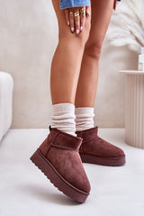 Stylish brown snow boots with ankle-high shaft