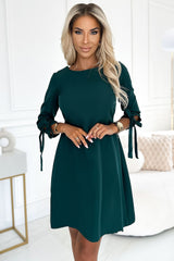 Elegant trapeze cocktail dress with bows