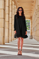 Long sleeve day dress with a decorative belt