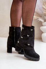 Women decorated turned-up upper heel boots