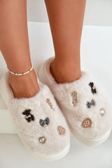 Women's fur slippers on a thick platform