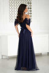 Beautiful long Spanish-style evening dress with plunging tulle sleeve